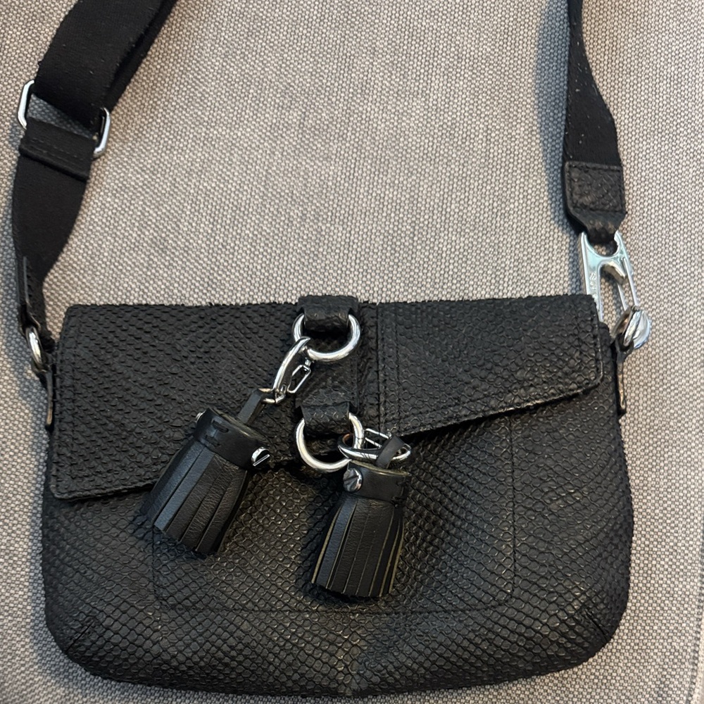 Elegant Black Leather crossbody bag with Tassels